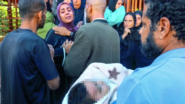 annesinin kucaginda kursunladilar l9QscI5n.webp