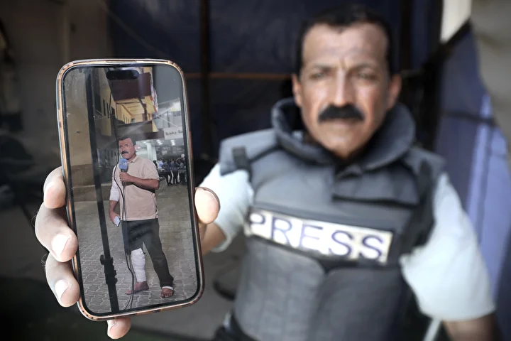 gazzede 53 yasindaki gazeteci kannan hucumlara karsin vazifesini surduruyor 17 5Liz4uzB