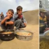 gazzede aclikla gayret eden filistinlilere yemek dagitildi WTzD9NAT.webp