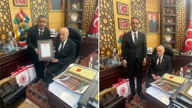 hizmete kazandirilan yeni teskilat binasinin tapusunu mhp lideri bahceliye takdim ettiler DSerMYZP.webp