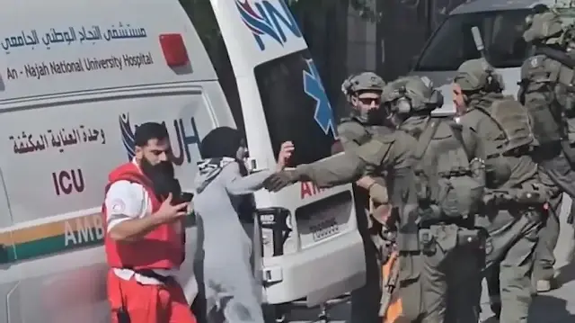 israil askerleri vurdugu filistinliyi vefata terk etti yardim etmek isteyen esini de darbettiler wIVaA69K.webp